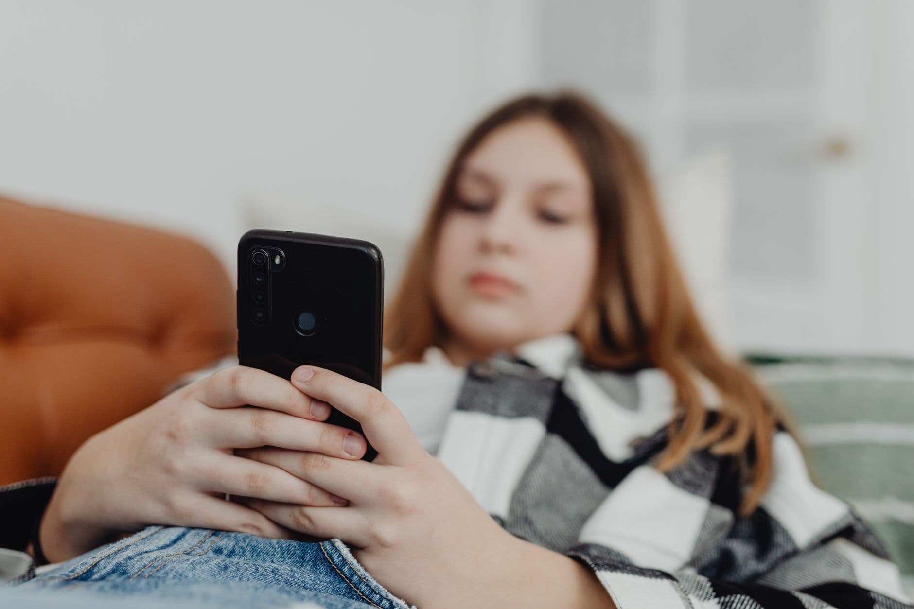 Teen using multiple social media apps on phone